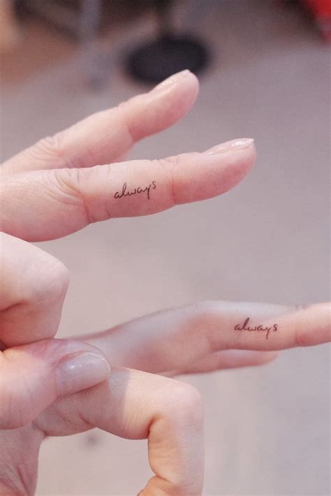 fingers touching tattoo meaning|small finger tattoos for ladies.